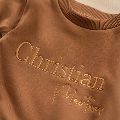 Baby romper color options with custom name embroidery