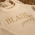 Personalized baby sweater for cozy milestone photos