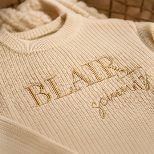 Personalized baby sweater for cozy milestone photos