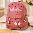 Personalized pink corduroy kids backpack with custom name detail