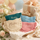 Muslin baby bib with personalized name detail close up
