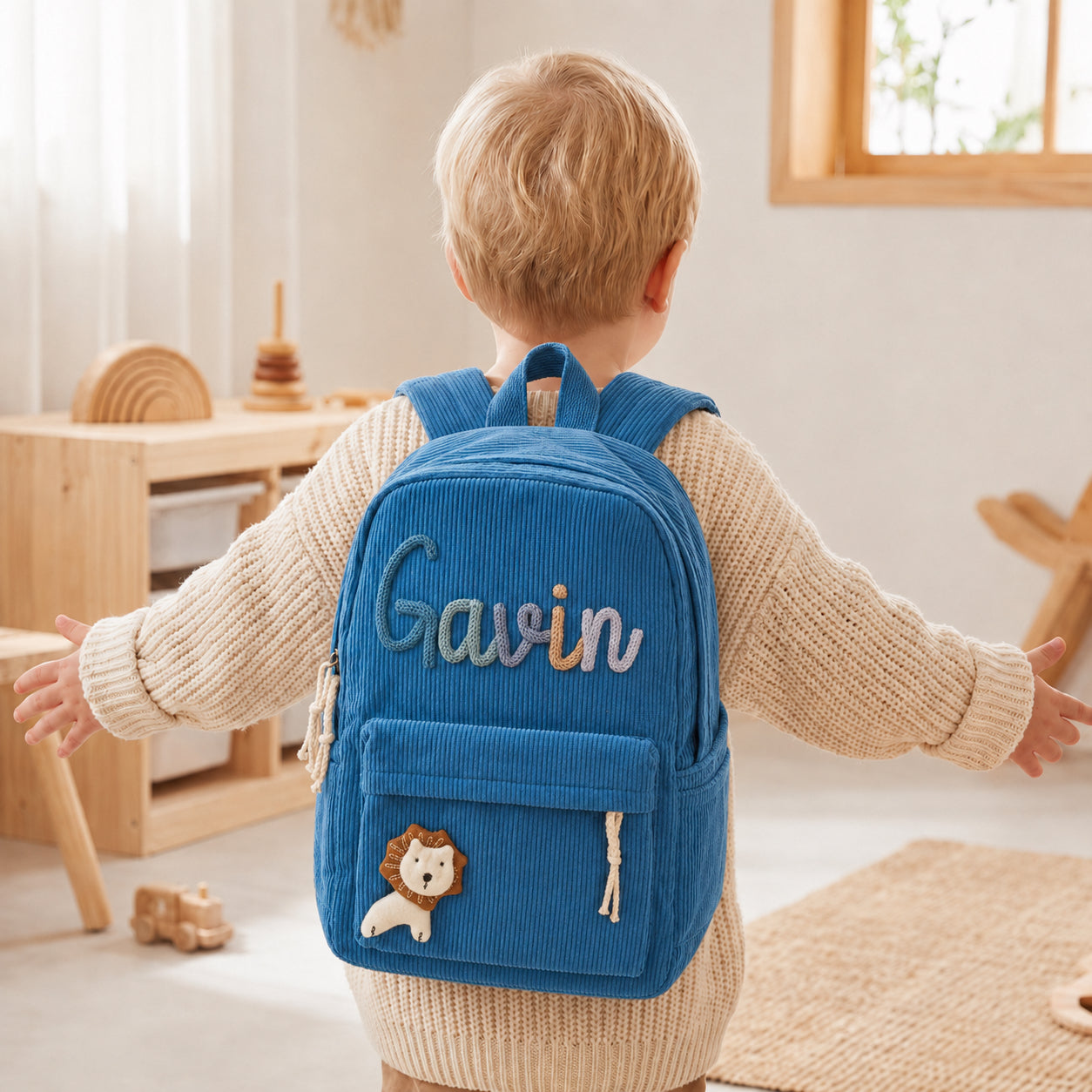 Personalized blue kids backpack with custom yarn name letters