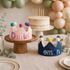 Colorful pom pom detail on baby birthday crown hat